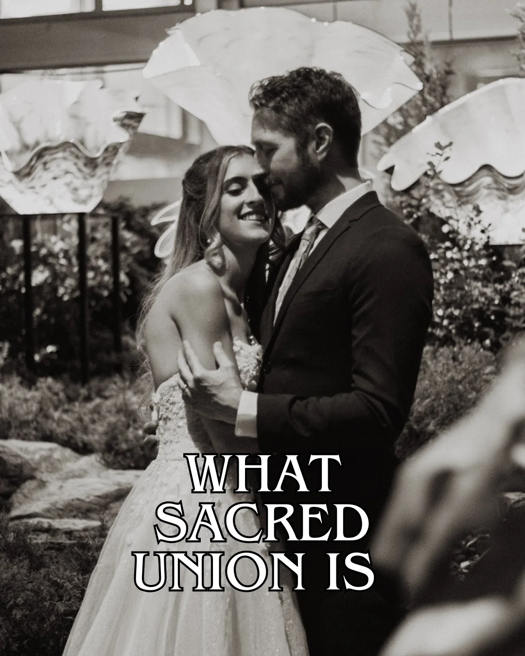 Black-and-white wedding portrait of Marissa and Eric embracing, with the words What Sacred Union Is.